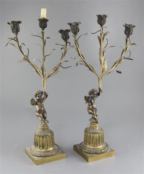 A pair of 19th century French bronze candelabra, 23in.